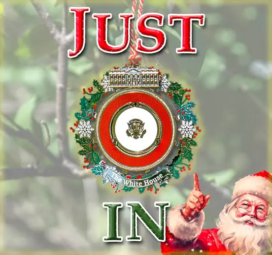 Festive ornament featuring the White House emblem hangs on a tree. Santa gestures merrily, with "Just In" text above.