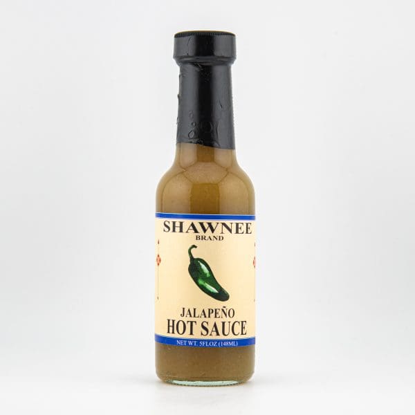 A bottle of Shawnee Brand Jalapeño Hot Sauce with a green pepper on the label, set against a plain white background.